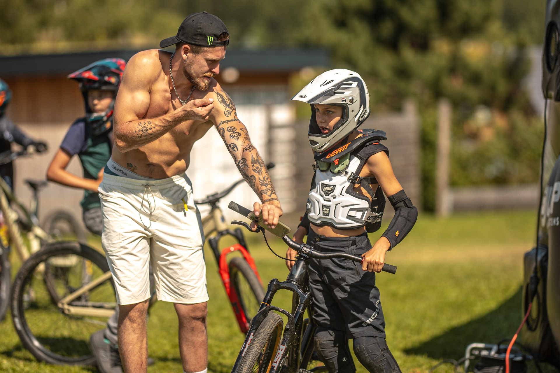 Daniel Ruso coaching a young rider at a kids camp